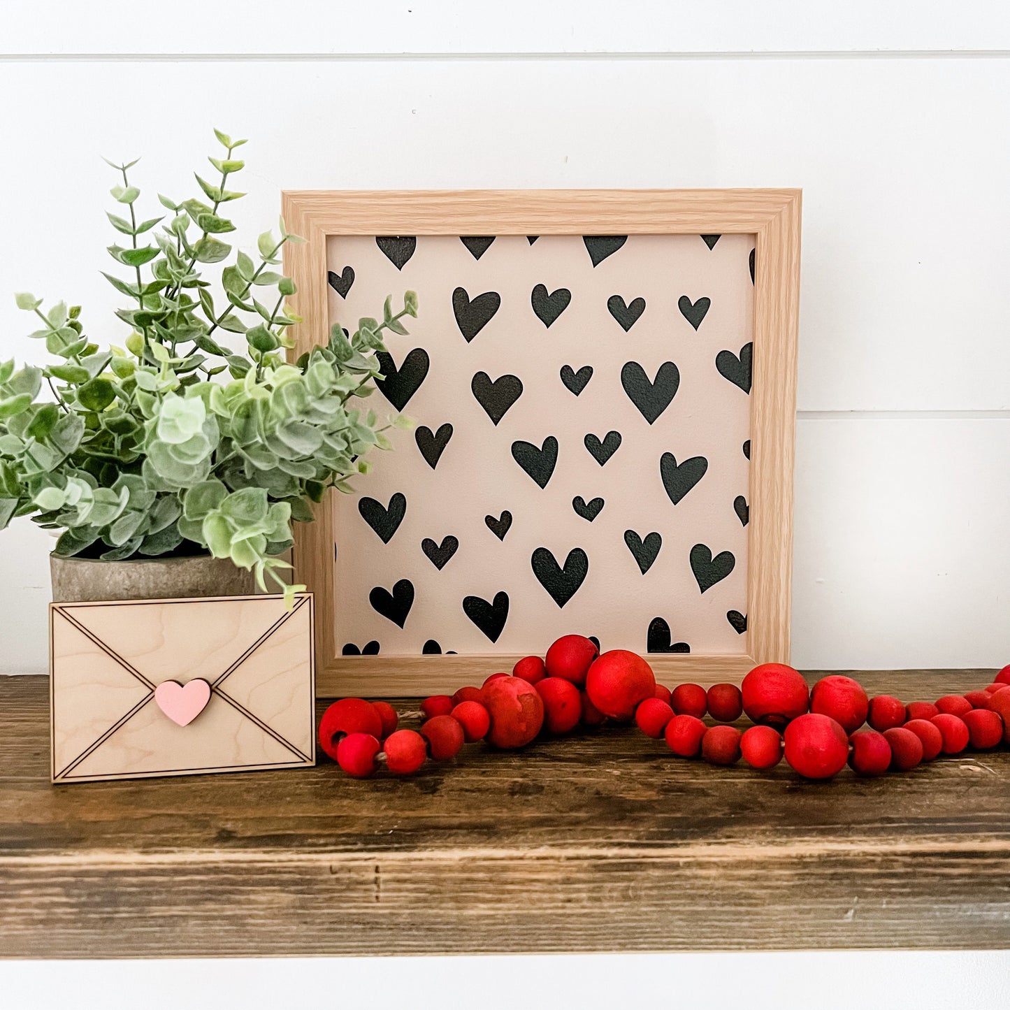 Black Hearts Background Layering Sign