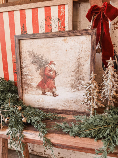 Santa Carrying Christmas Tree Wood Sign