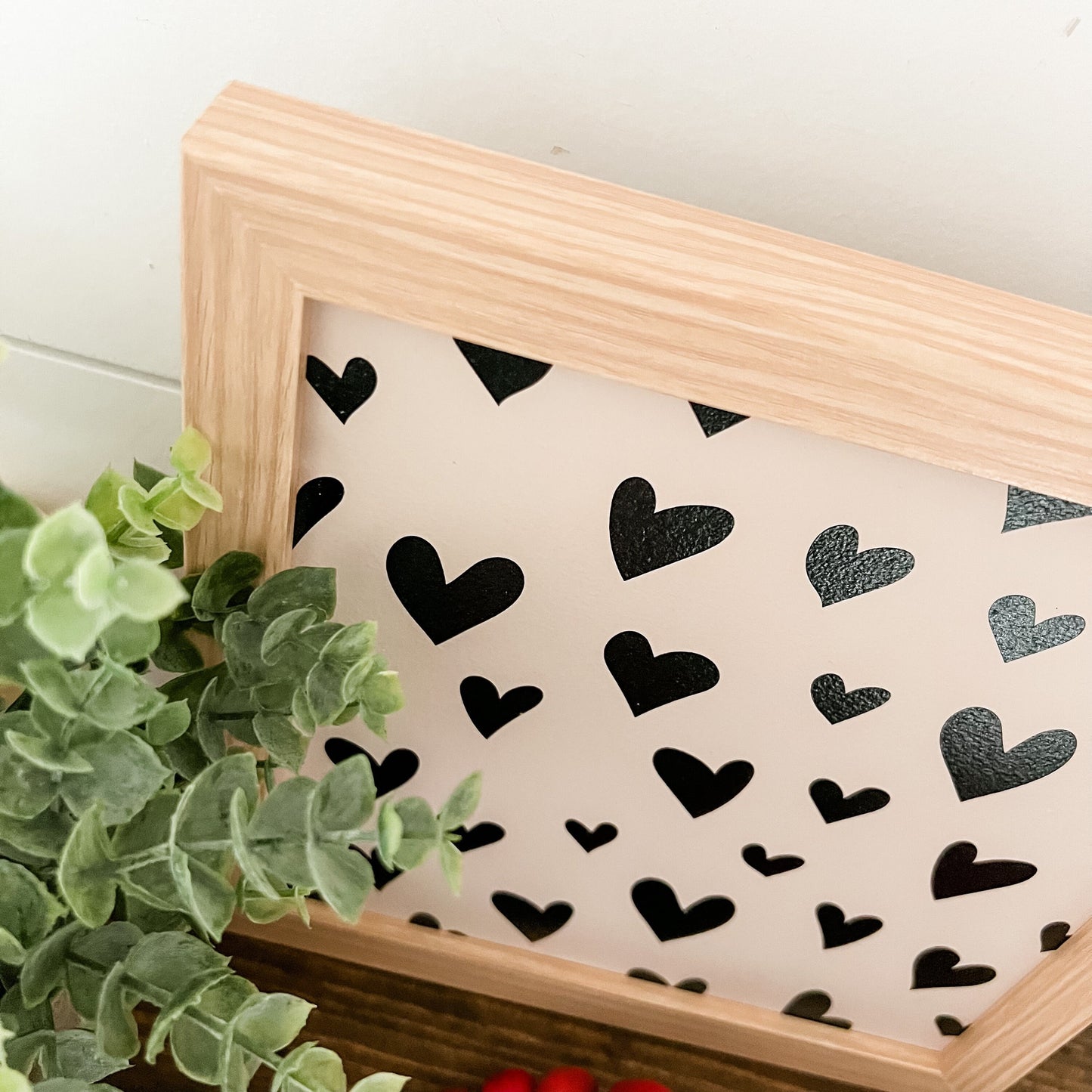 Black Hearts Background Layering Sign