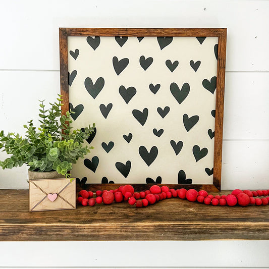 Black Hearts Background Layering Sign