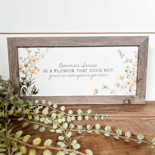 Common Sense is A Flower Saying Sign